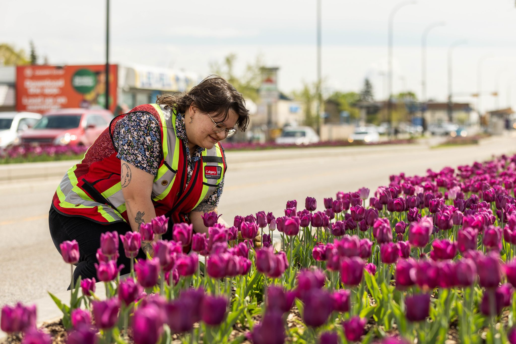 Woman admiring the tulips