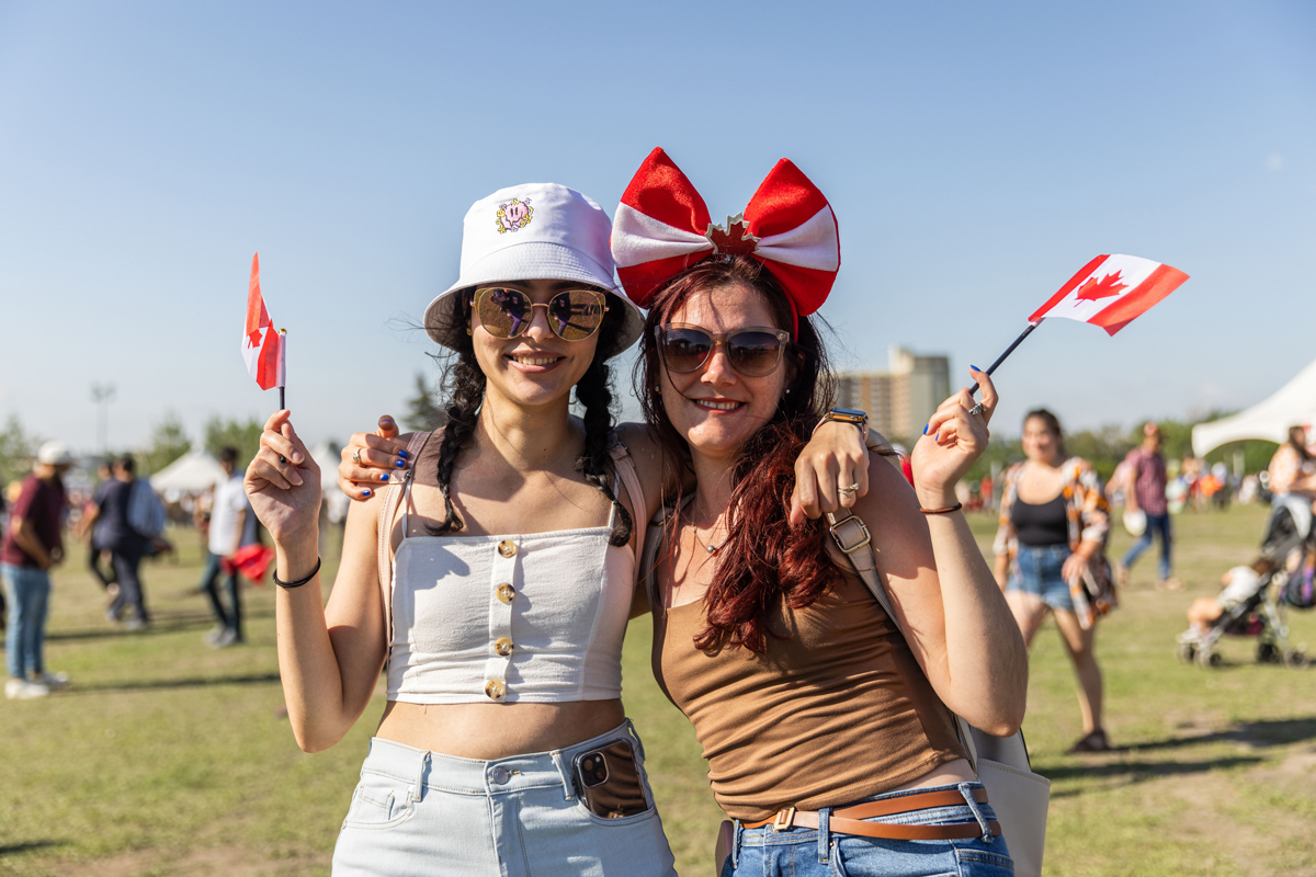 two people celebrating Canada Day